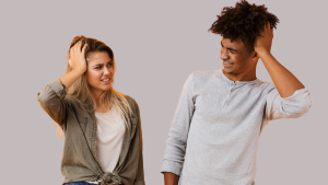 Couple looking at each other with confused expressions, representing miscommunication in marriage